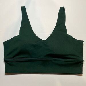 Coreio woman’s emerald green sports bra. Size M. NWT